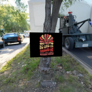 No One is Illegal on Stolen Land Yard Sign Fuck Trump